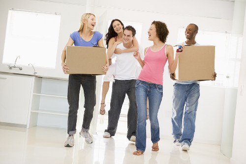 Professional flat removal team preparing furniture for a move in Mayfair