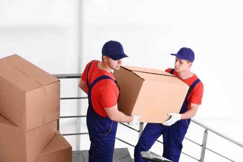 Local moving team handling boxes and furniture for a Mayfair property move
