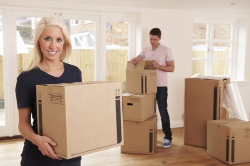 Office packing boxes and labelled cartons for a Mayfair business move