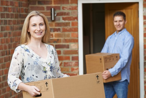 Careful wrapping of fragile household items during packing