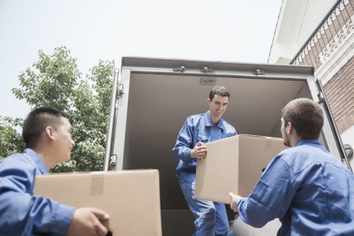 Removal team loading furniture near Mayfair properties