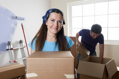 Careful loading of fragile household items during a Mayfair home move