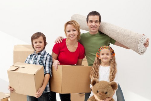 Local moving van helping with apartment access and loading in Mayfair