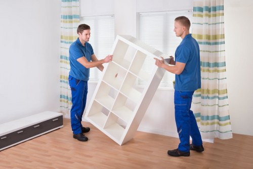 Commercial movers handling furniture and IT during a Mayfair office move